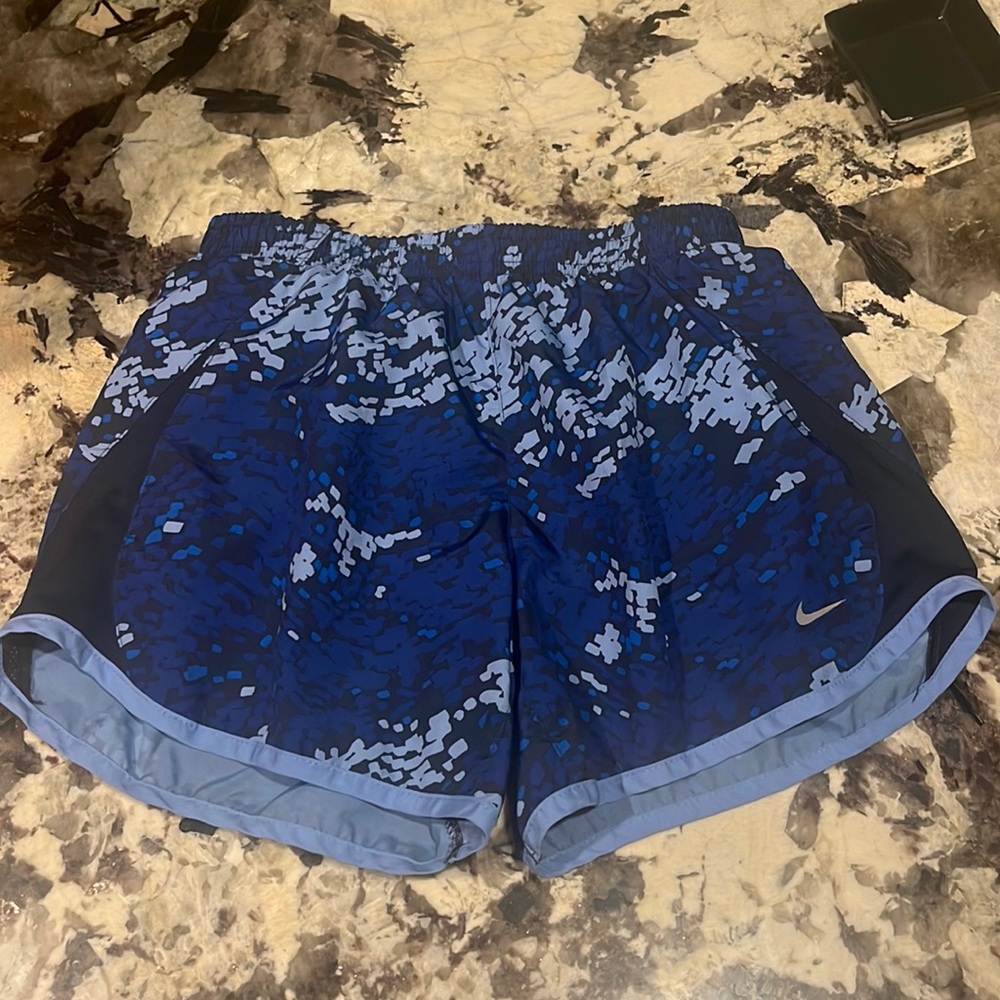 Different shades of blue Nike dri-fit shorts